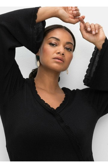 Trikotāžas Sheego kleita ar dziļu V veida izgriezumu Trikotāžas Sheego kleita ar dziļu V veida izgriezumu